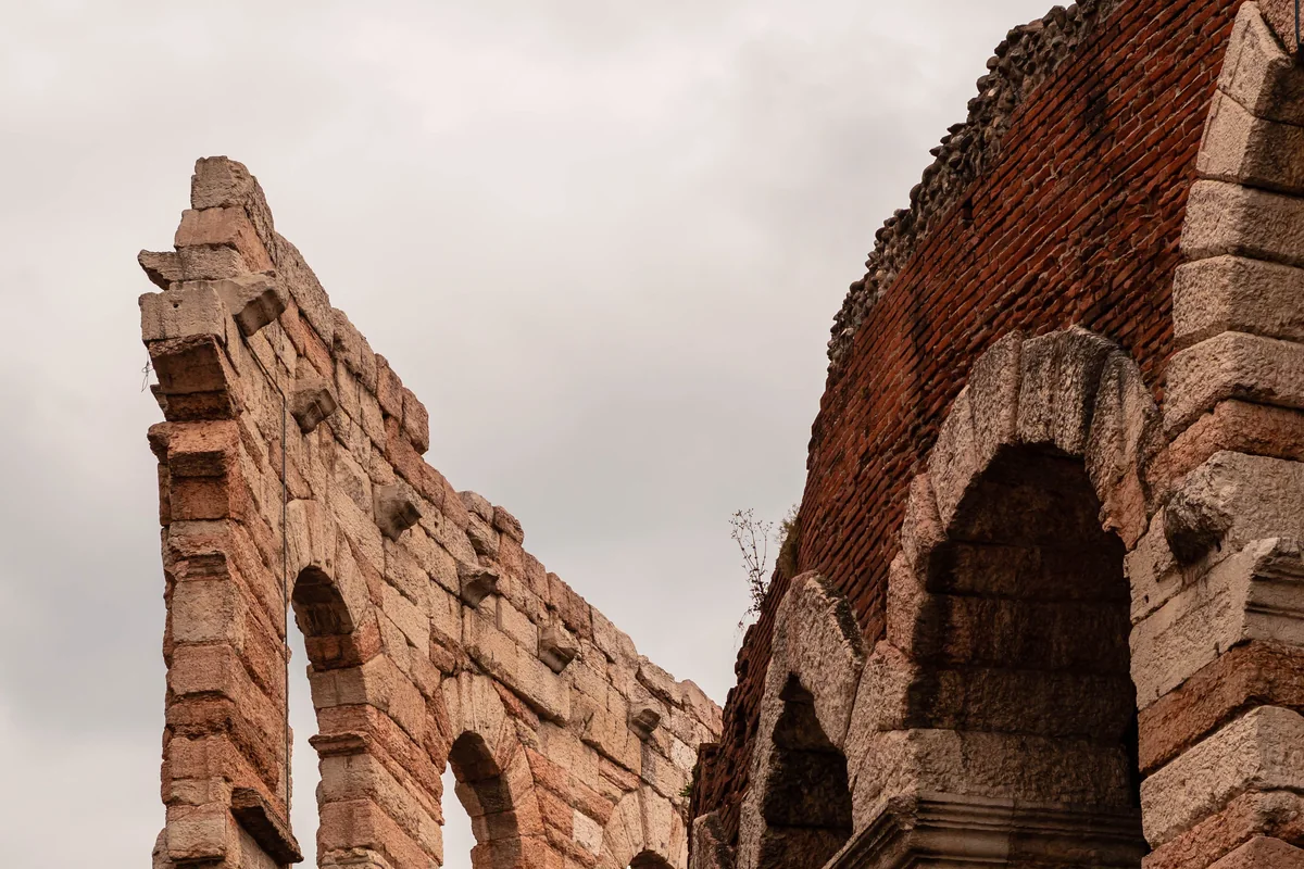 The red-brick exterior arches of the Roman amphitheatre in Verona